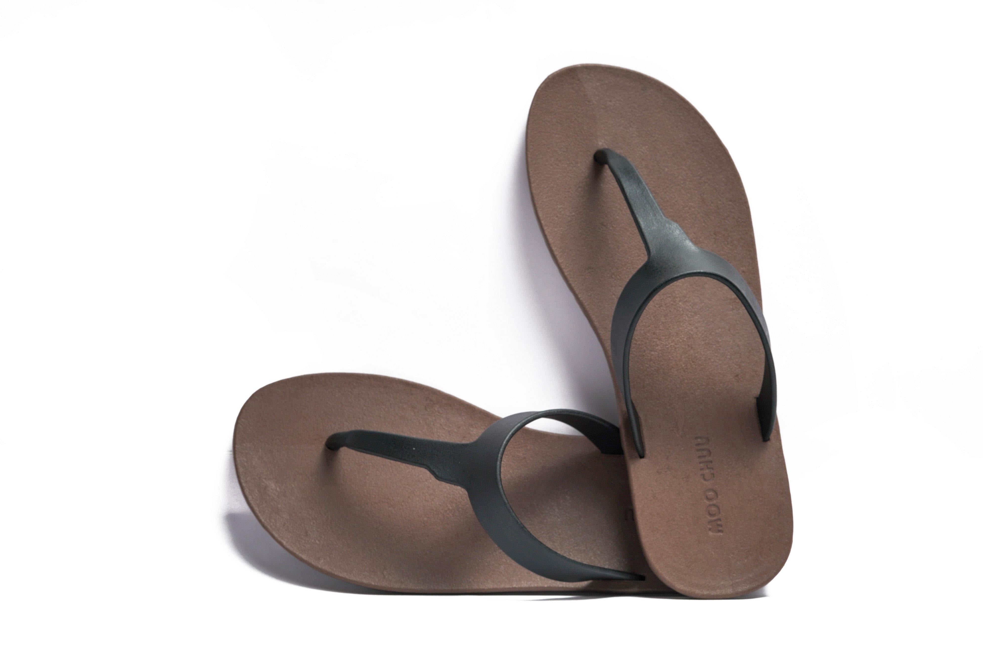 Tan flip flops discount with black straps