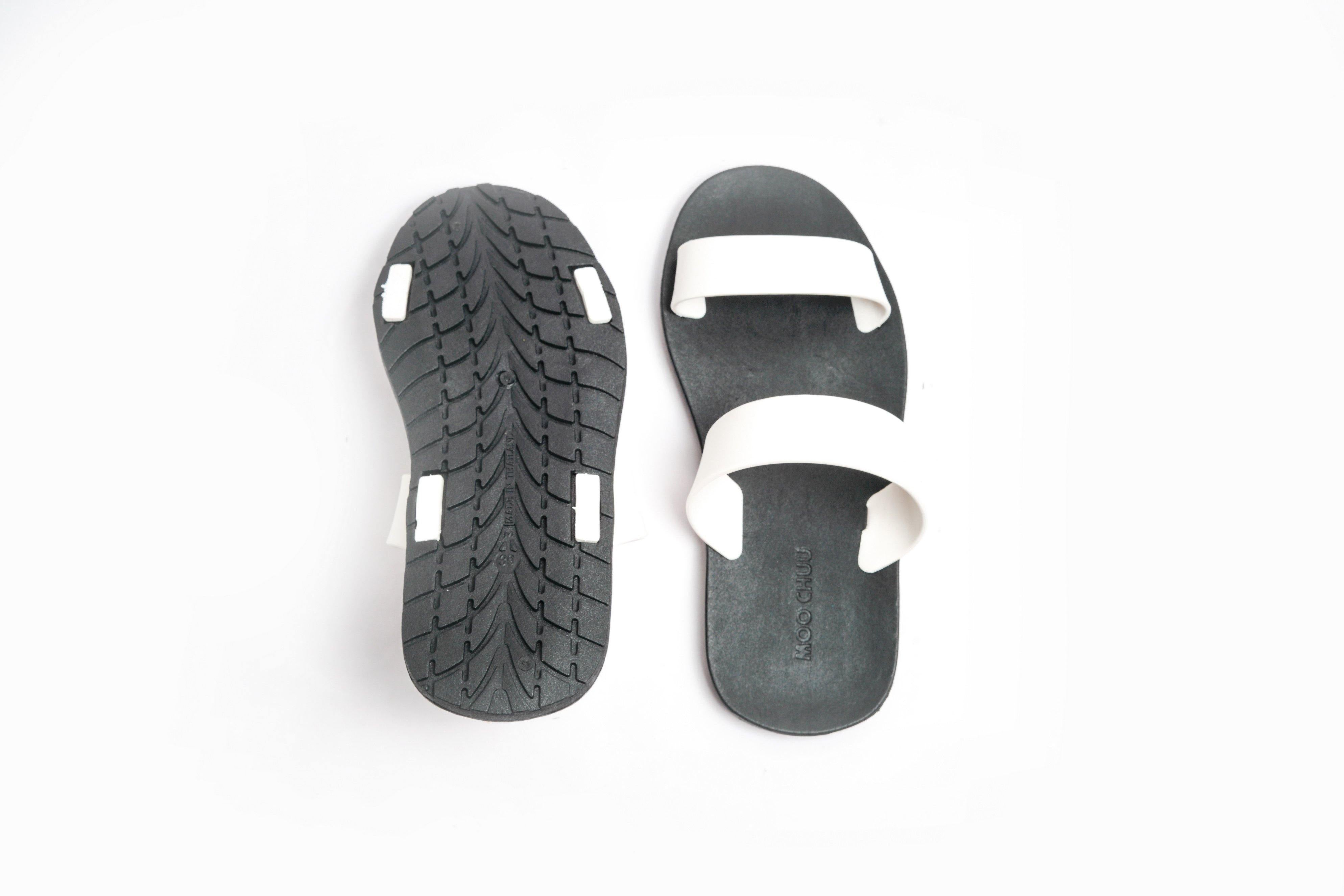 Black white best sale flip flops