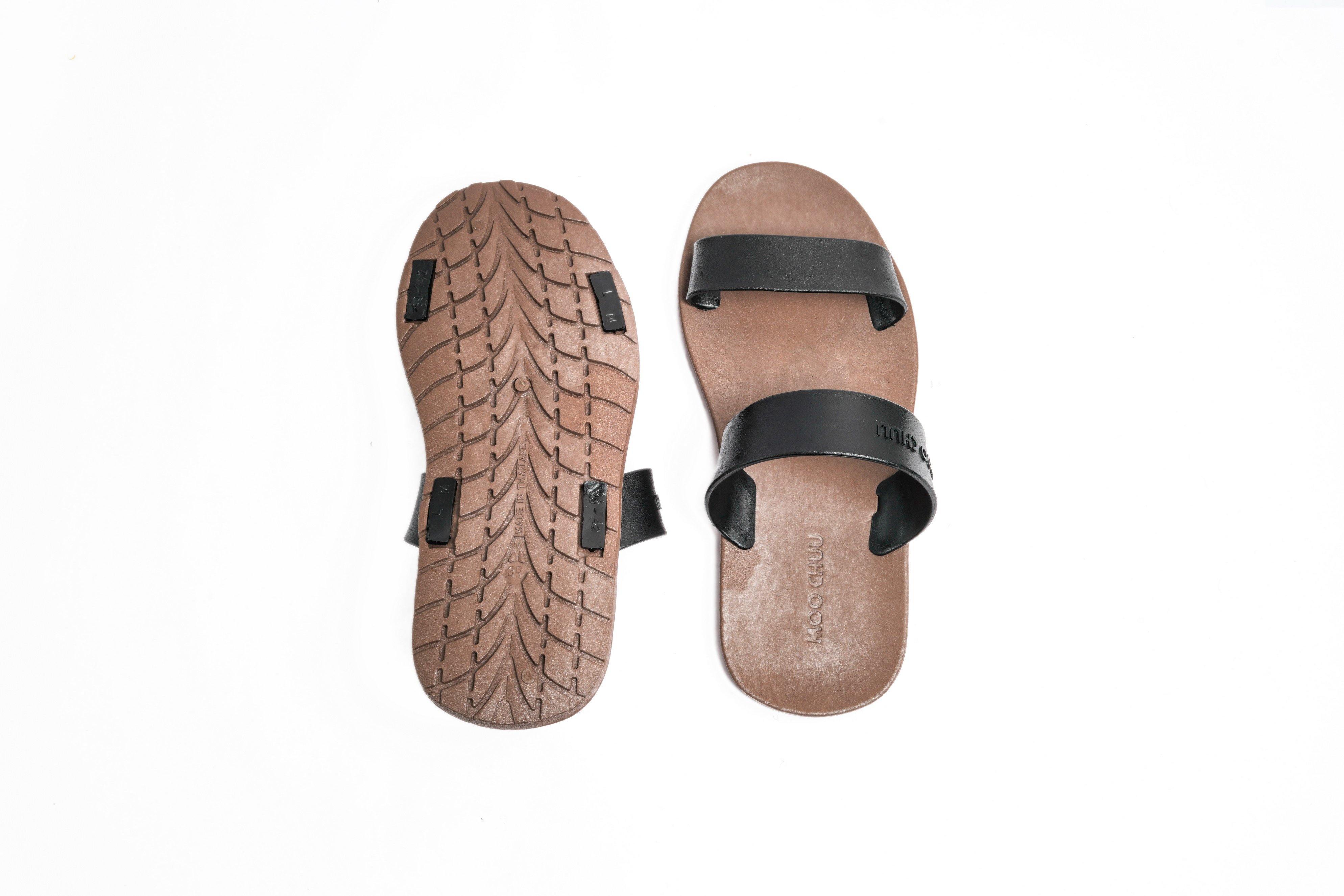 Tan flip flops with black online straps